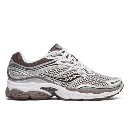 White running shoe with black and green accents on a white background