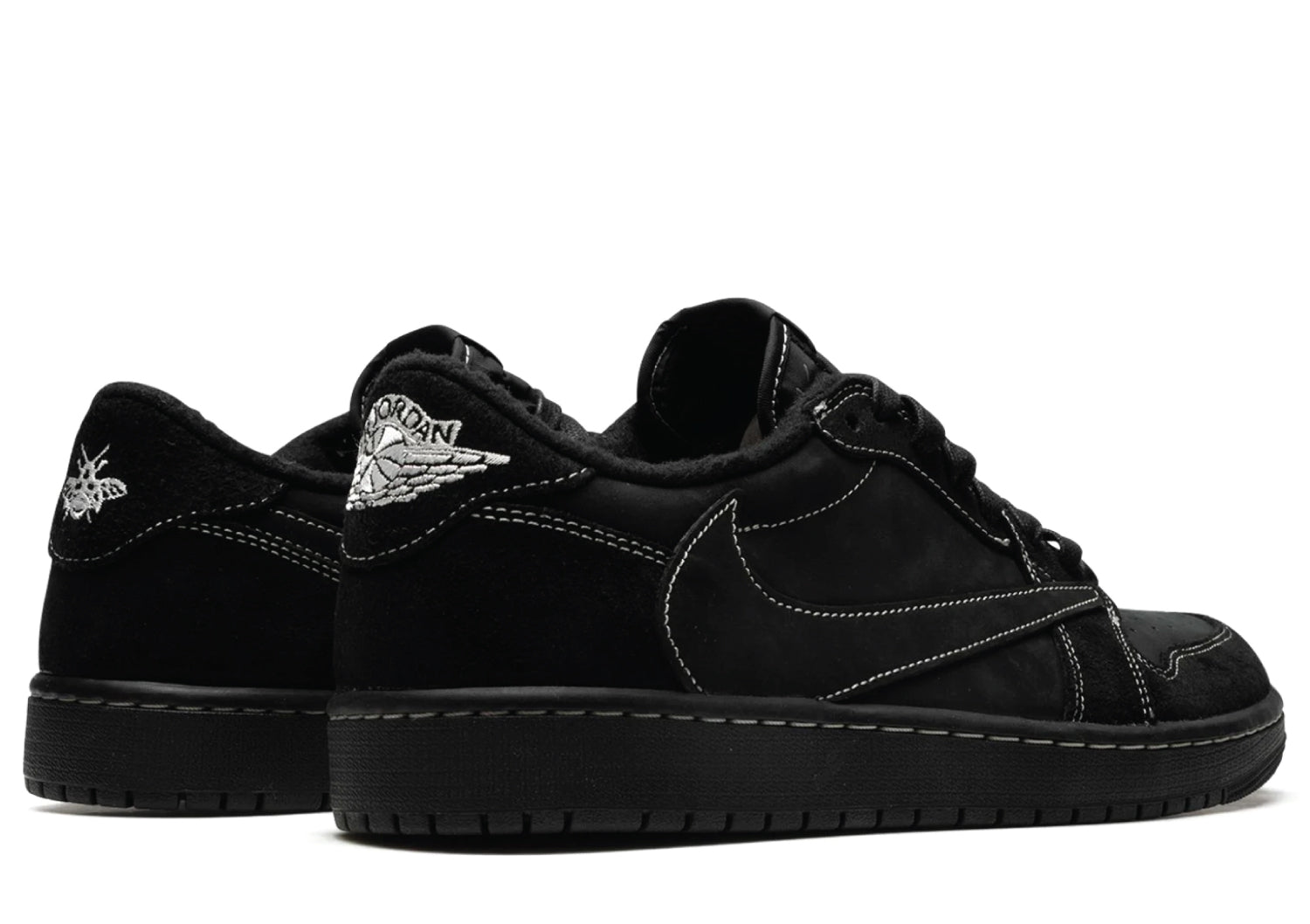 Black sneakers with brand logo on a white background